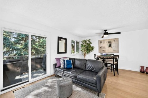 D-109 Stanley Avenue, Okotoks, AB - Indoor Photo Showing Living Room