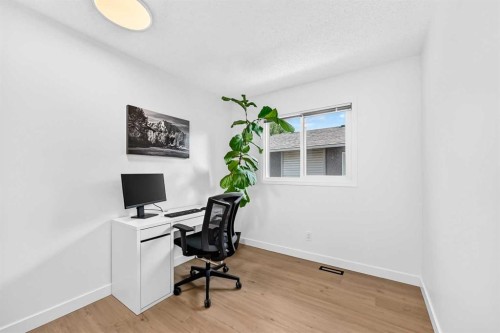 D-109 Stanley Avenue, Okotoks, AB - Indoor Photo Showing Office