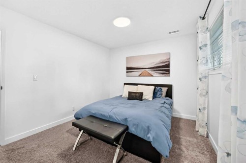D-109 Stanley Avenue, Okotoks, AB - Indoor Photo Showing Bedroom