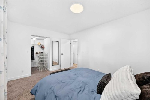D-109 Stanley Avenue, Okotoks, AB - Indoor Photo Showing Bedroom