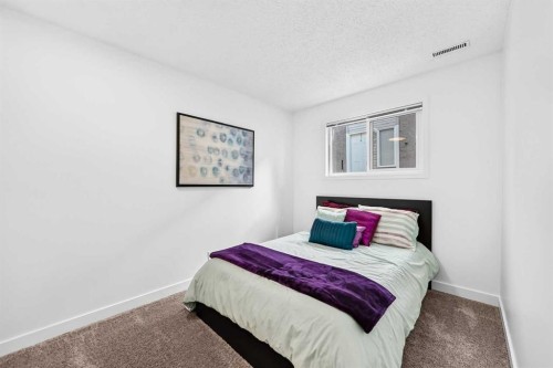 D-109 Stanley Avenue, Okotoks, AB - Indoor Photo Showing Bedroom