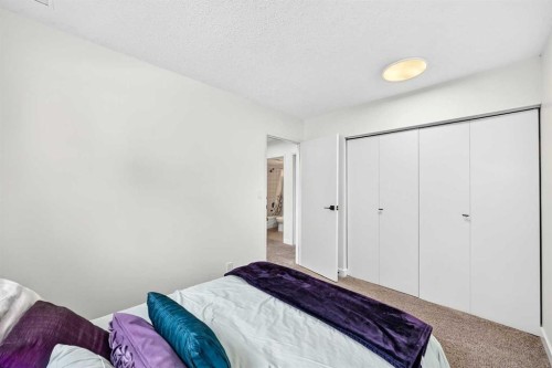 D-109 Stanley Avenue, Okotoks, AB - Indoor Photo Showing Bedroom
