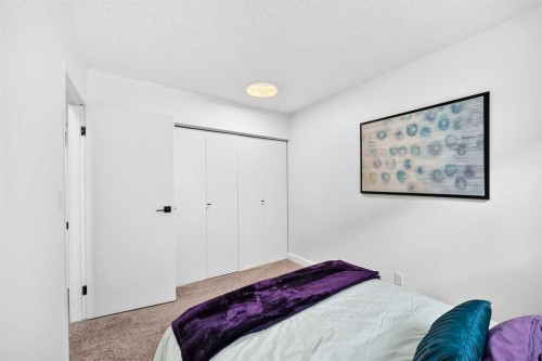 D-109 Stanley Avenue, Okotoks, AB - Indoor Photo Showing Bedroom