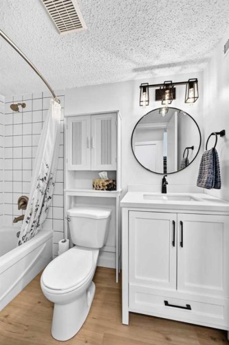 D-109 Stanley Avenue, Okotoks, AB - Indoor Photo Showing Bathroom