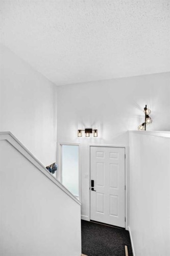 D-109 Stanley Avenue, Okotoks, AB - Indoor Photo Showing Other Room