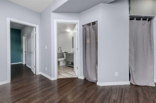 25 Prestwick Pond Terrace Se, Calgary, AB - Indoor Photo Showing Other Room