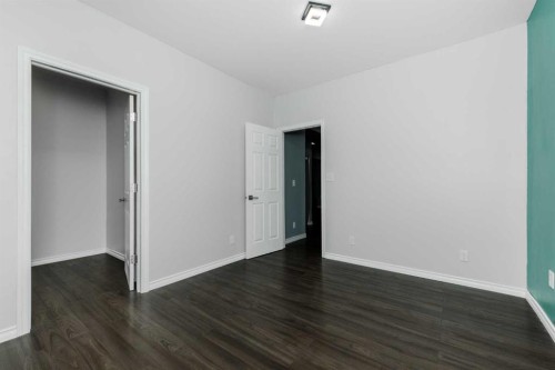 25 Prestwick Pond Terrace Se, Calgary, AB - Indoor Photo Showing Other Room