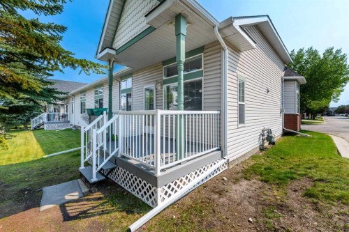 25 Prestwick Pond Terrace Se, Calgary, AB - Outdoor With Deck Patio Veranda