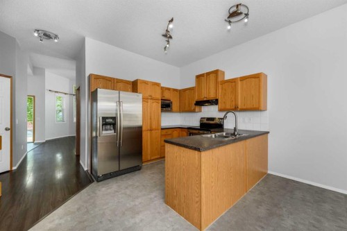 25 Prestwick Pond Terrace Se, Calgary, AB - Indoor Photo Showing Kitchen With Stainless Steel Kitchen