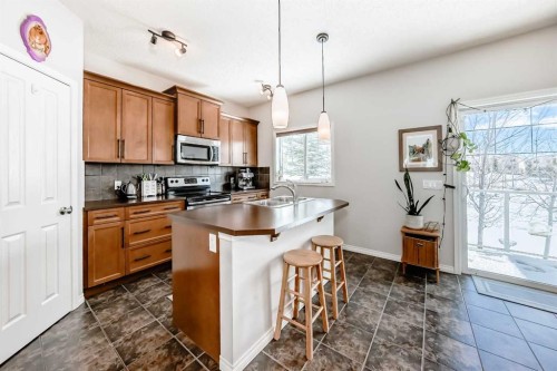 296 Sunset Point, Cochrane, AB - Indoor Photo Showing Kitchen