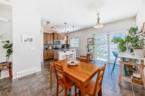 296 Sunset Point, Cochrane, AB - Indoor Photo Showing Dining Room
