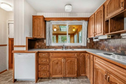 4515 Norquay Drive Nw, Calgary, AB - Indoor Photo Showing Kitchen With Double Sink
