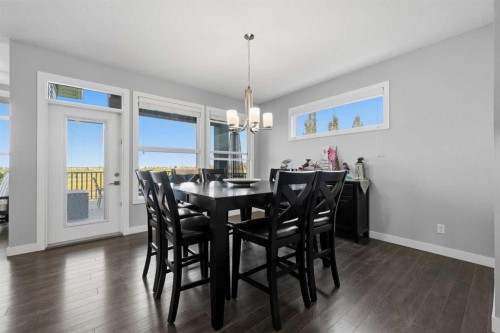 395 Boulder Creek Bay Se, Langdon, AB - Indoor Photo Showing Dining Room