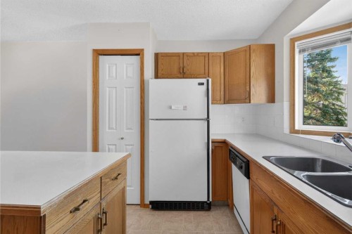 52 Glenbrook Villas Sw, Calgary, AB - Indoor Photo Showing Kitchen With Double Sink