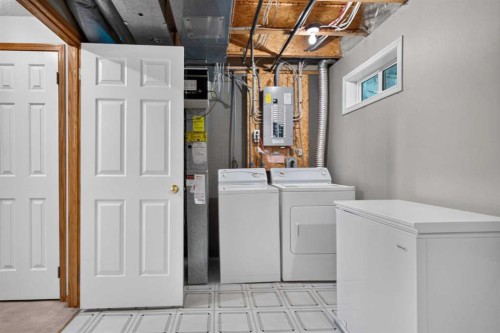52 Glenbrook Villas Sw, Calgary, AB - Indoor Photo Showing Laundry Room