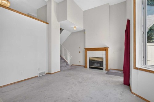 52 Glenbrook Villas Sw, Calgary, AB - Indoor With Fireplace