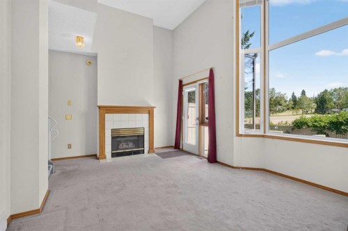 52 Glenbrook Villas Sw, Calgary, AB - Indoor With Fireplace