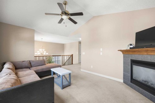 162 Sherwood Hill Nw, Calgary, AB - Indoor Photo Showing Living Room With Fireplace