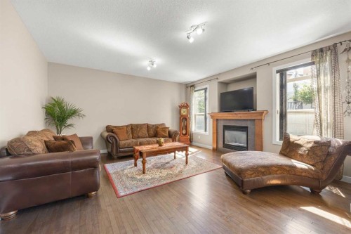 162 Sherwood Hill Nw, Calgary, AB - Indoor Photo Showing Living Room With Fireplace