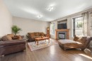 162 Sherwood Hill Nw, Calgary, AB  - Indoor Photo Showing Living Room With Fireplace 
