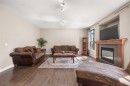 162 Sherwood Hill Nw, Calgary, AB  - Indoor Photo Showing Living Room With Fireplace 