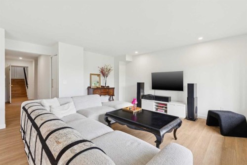 84 Edenstone Way Nw, Calgary, AB - Indoor Photo Showing Living Room