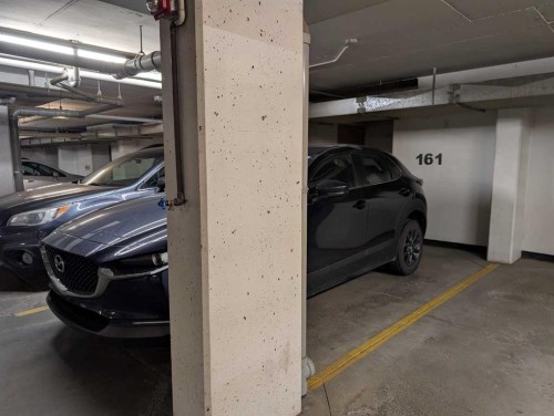 1421-8 Bridlecrest Drive Sw, Calgary, AB - Indoor Photo Showing Garage