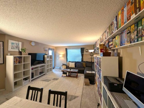 1421-8 Bridlecrest Drive Sw, Calgary, AB - Indoor With Fireplace