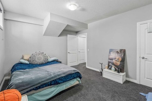 2257 Bayside Circle Sw, Airdrie, AB - Indoor Photo Showing Bedroom
