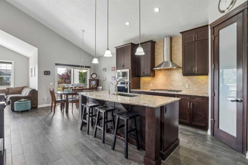 2257 Bayside Circle Sw, Airdrie, AB - Indoor Photo Showing Kitchen With Upgraded Kitchen