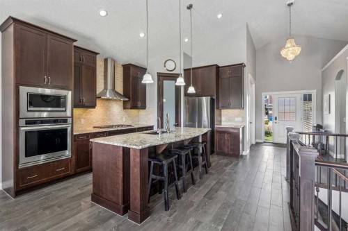 2257 Bayside Circle Sw, Airdrie, AB - Indoor Photo Showing Kitchen With Upgraded Kitchen