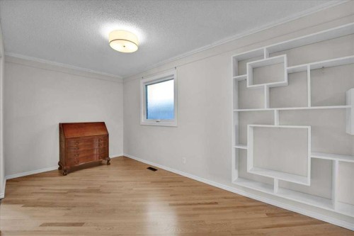 228 Nottingham Road Nw, Calgary, AB - Indoor Photo Showing Other Room