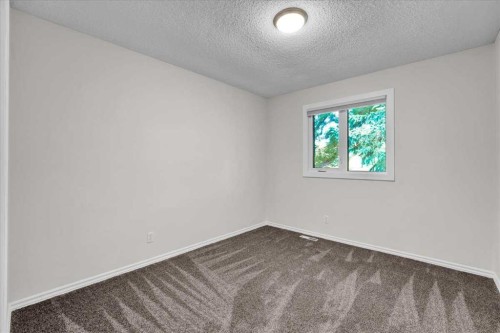 228 Nottingham Road Nw, Calgary, AB - Indoor Photo Showing Other Room