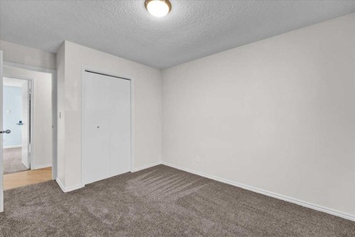 228 Nottingham Road Nw, Calgary, AB - Indoor Photo Showing Other Room