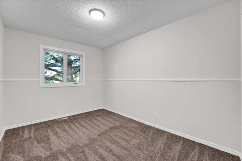 228 Nottingham Road Nw, Calgary, AB - Indoor Photo Showing Other Room