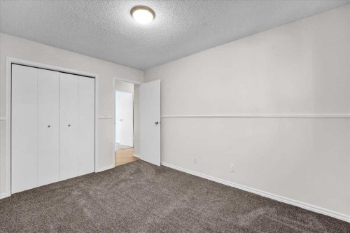228 Nottingham Road Nw, Calgary, AB - Indoor Photo Showing Other Room