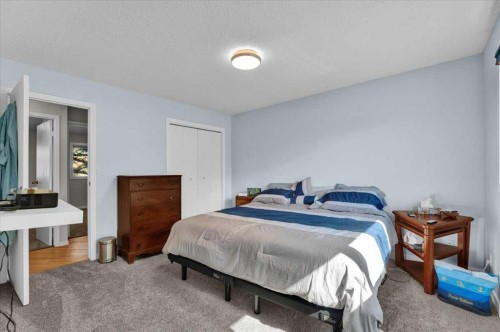 228 Nottingham Road Nw, Calgary, AB - Indoor Photo Showing Bedroom