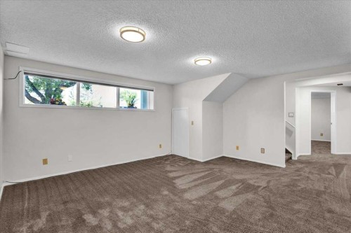 228 Nottingham Road Nw, Calgary, AB - Indoor Photo Showing Other Room