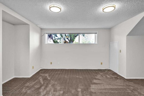 228 Nottingham Road Nw, Calgary, AB - Indoor Photo Showing Other Room