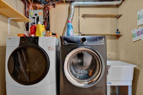 228 Nottingham Road Nw, Calgary, AB - Indoor Photo Showing Laundry Room