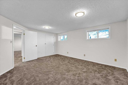 228 Nottingham Road Nw, Calgary, AB - Indoor Photo Showing Other Room