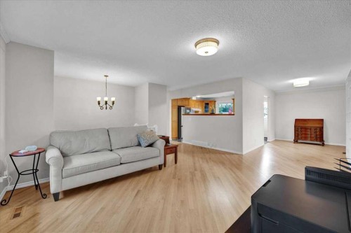 228 Nottingham Road Nw, Calgary, AB - Indoor Photo Showing Living Room