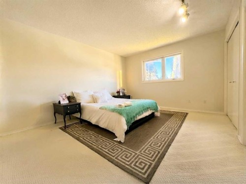 123 Sunmills Place Sw, Calgary, AB - Indoor Photo Showing Bedroom