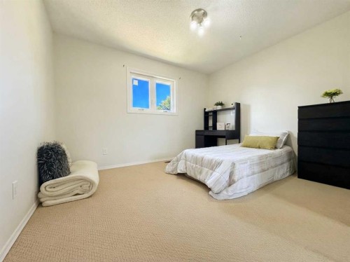 123 Sunmills Place Sw, Calgary, AB - Indoor Photo Showing Bedroom