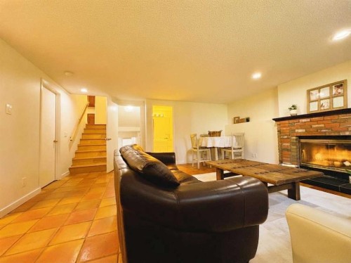 123 Sunmills Place Sw, Calgary, AB - Indoor Photo Showing Living Room With Fireplace