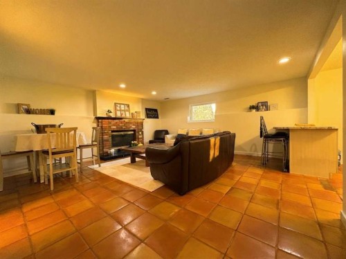123 Sunmills Place Sw, Calgary, AB - Indoor Photo Showing Living Room With Fireplace