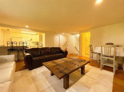 123 Sunmills Place Sw, Calgary, AB - Indoor Photo Showing Living Room