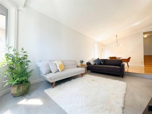 123 Sunmills Place Sw, Calgary, AB - Indoor Photo Showing Living Room