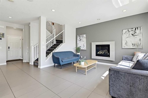 71 Chaparral Valley Way Se, Calgary, AB - Indoor Photo Showing Living Room With Fireplace