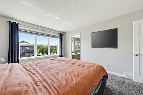 71 Chaparral Valley Way Se, Calgary, AB - Indoor Photo Showing Bedroom